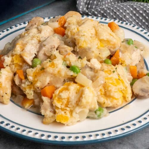 Chicken pot pie casserole on a plate ready to eat.